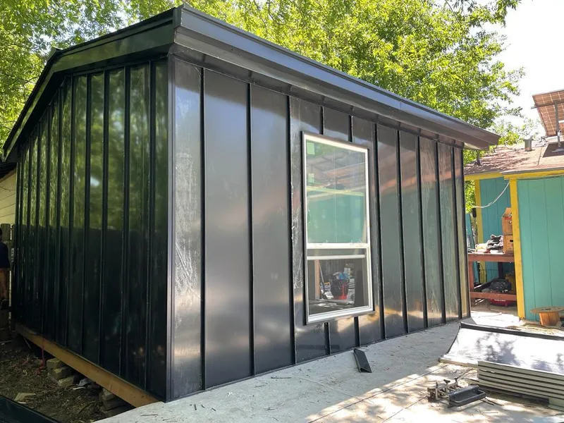 Black standing seam metal wall panels for Metal Roof Installation in Gardner