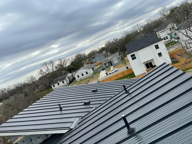 Standing seam metal roof panels with vents for Skylight Repair in Gardner